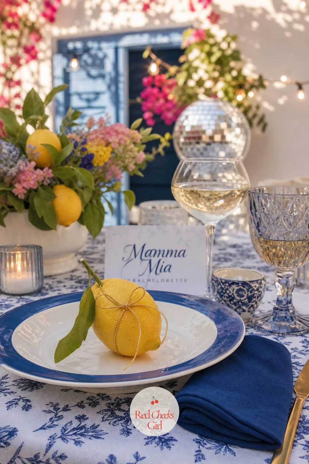 Blue and White Plates with Lemons Place Setting — Up close, this is the detail a guest actually notices while she is sitting down: a blue rimmed ceramic plate