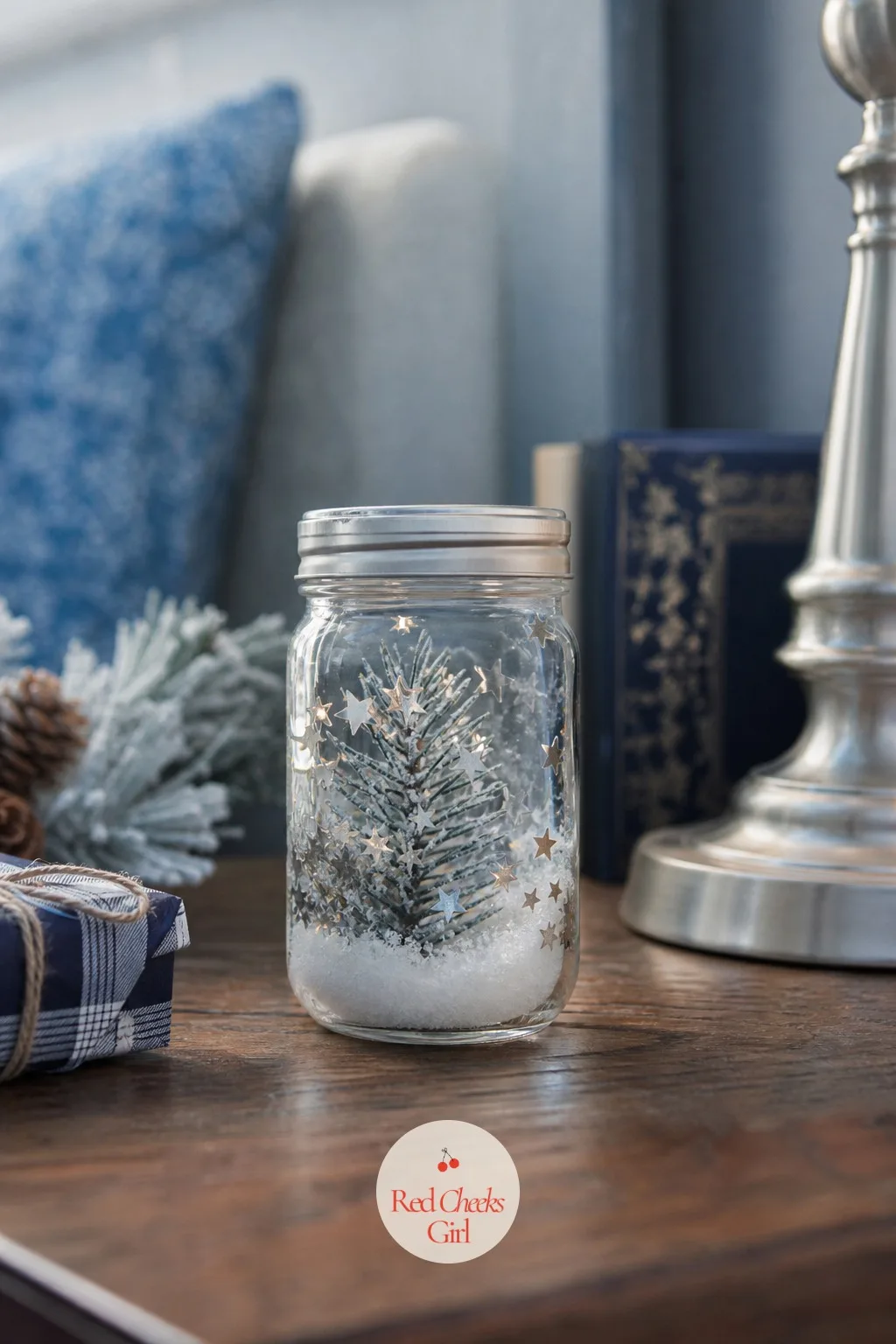Blue Spruce and Silver Star Snow Globe — The classic snow globe palette of red and green can feel a little loud on a bedside table or in a guest bathroom.