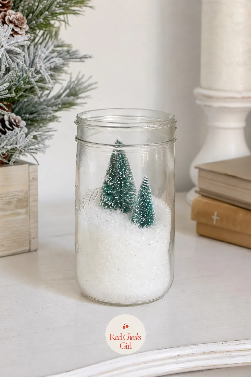 Bottle Brush Forest in Glitter Snow — A snow globe you shake eventually leaks glitter water onto the shelf. Mason jar christmas crafts