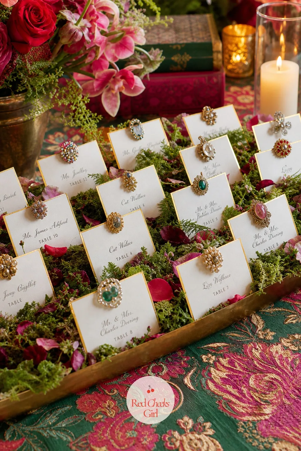 A Brooch-Pinned Place Card Display — Place cards lined up flat on a table disappear next to everything else happening on it. Maximalist wedding decor