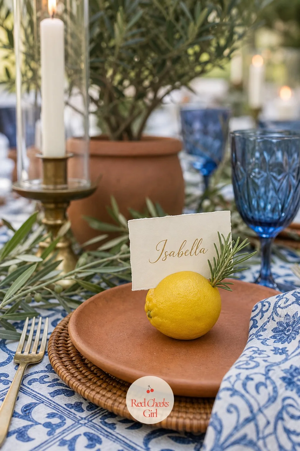 Lemon and Rosemary Place Cards — A folded card with a name on it is easy to lose in a stack; a place card tucked into a fresh lemon is not. Mediterranean
