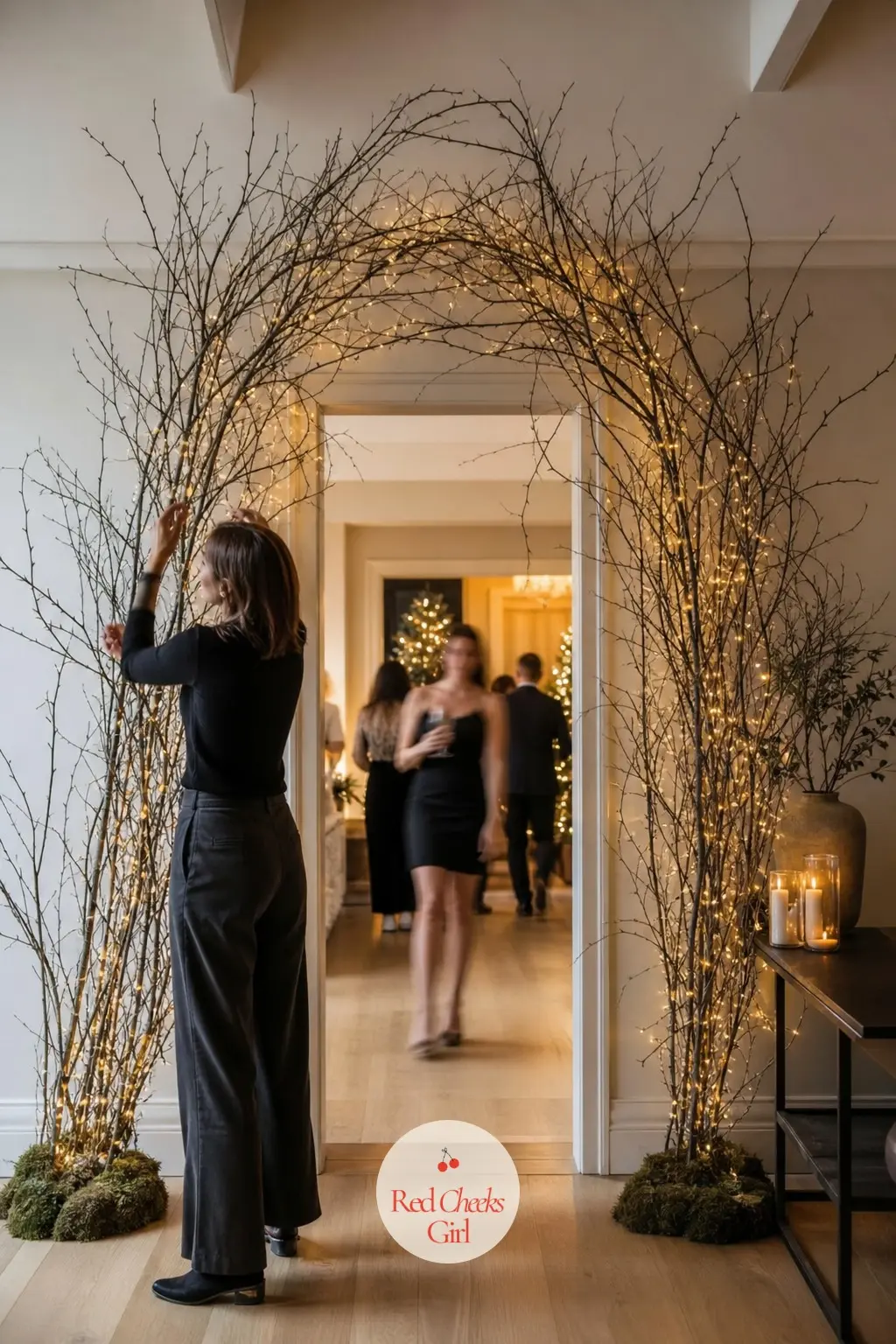 A Bare Branch Arch Over The Doorway Between Rooms — Instead of a garland over the doorway between the living and dining rooms, bind bare branch stems into a