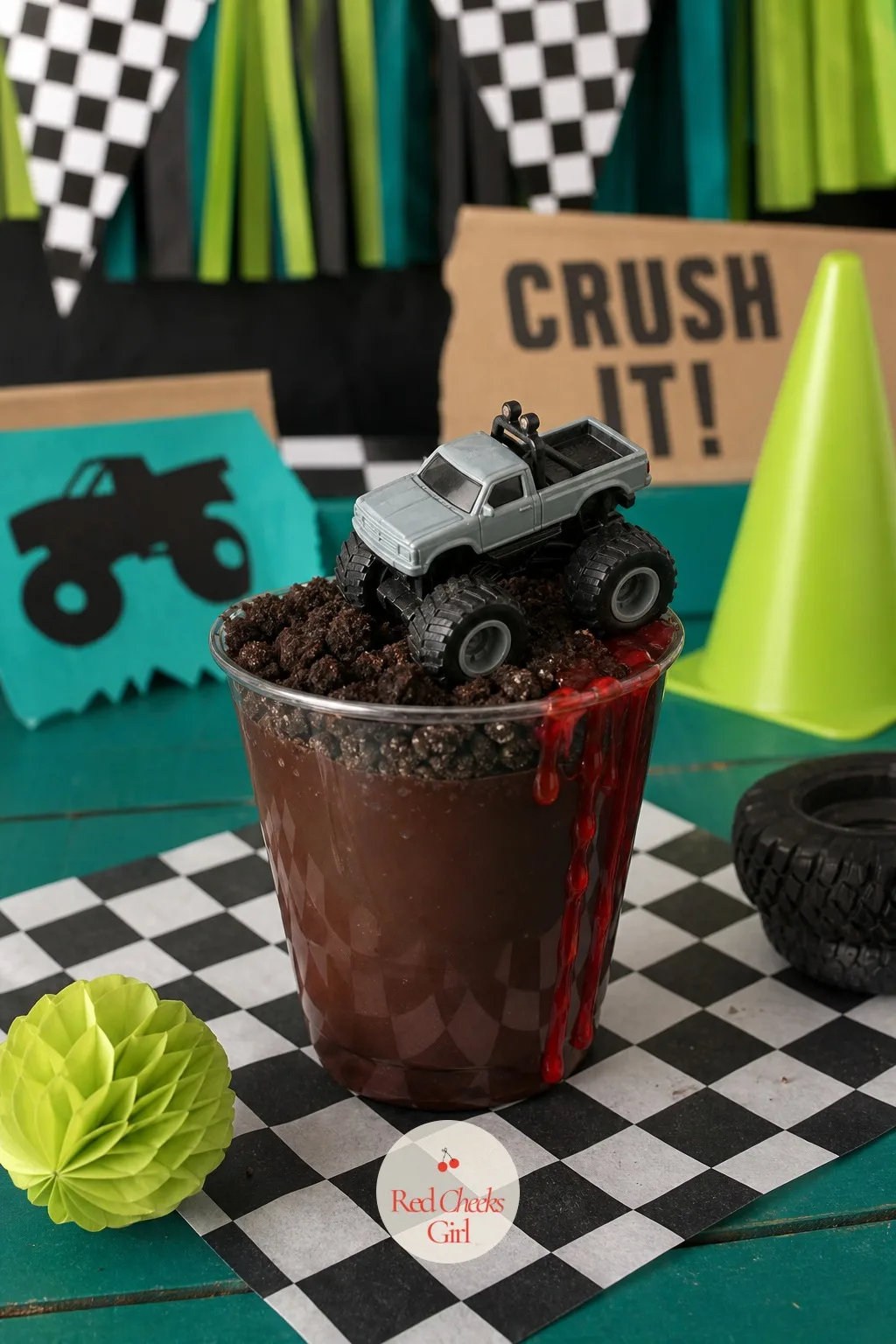 Pudding and Cookie Crumb Crash Cups — Individual cups solve the one problem every kids' dessert table has: sticky hands near a shared knife. Monster truck