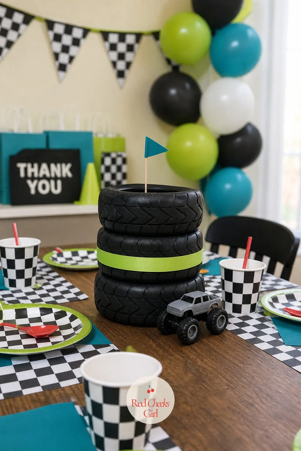 Spare Tire Centerpiece — A centerpiece that looks store-bought usually is not: it is three tire shapes stacked in a column. Monster truck birthday party ideas