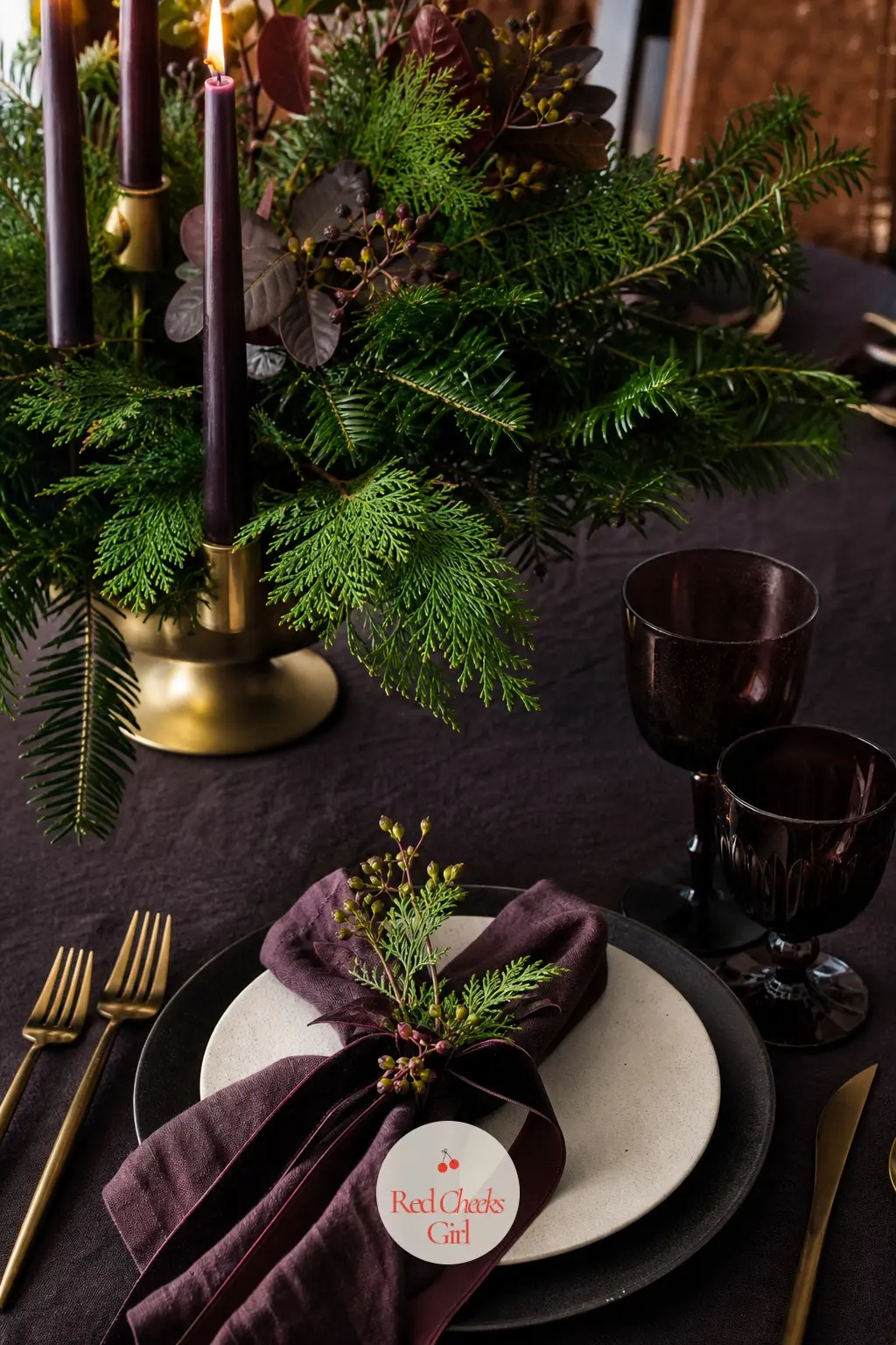 The Dining Table: Centrepiece and One Place Setting — One place setting tells the whole table's story: a charcoal charger, a napkin folded in oxblood velvet
