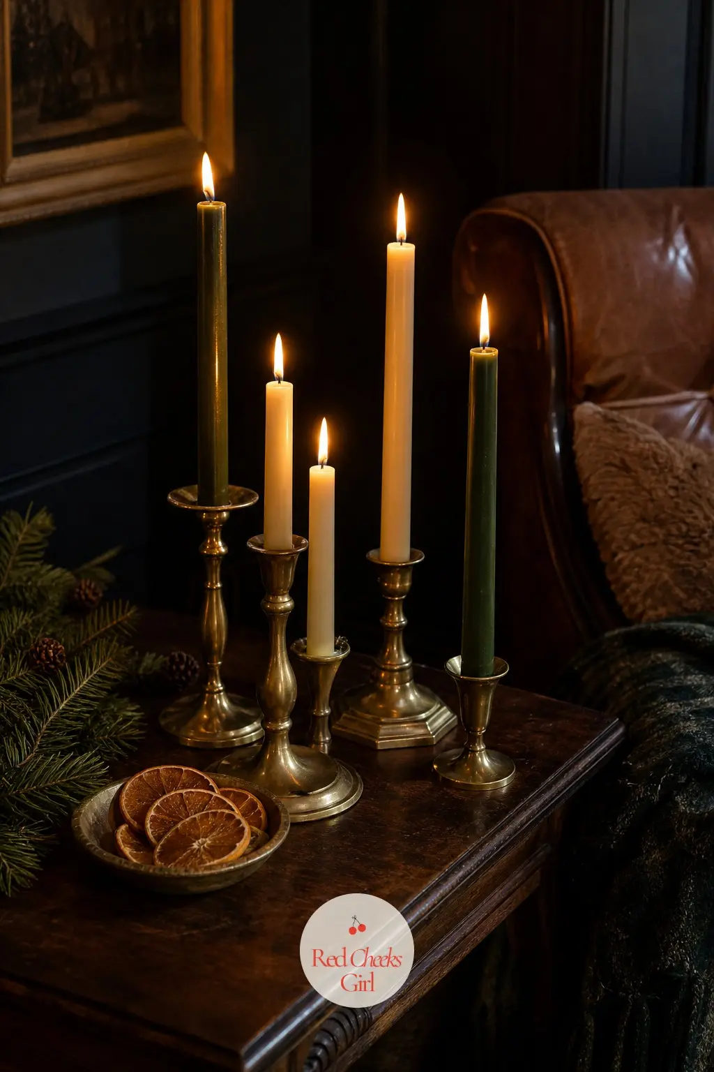 The Side Table Candle Cluster — A small side table next to the reading chair holds nothing but a cluster of taper candles at different heights in mismatched