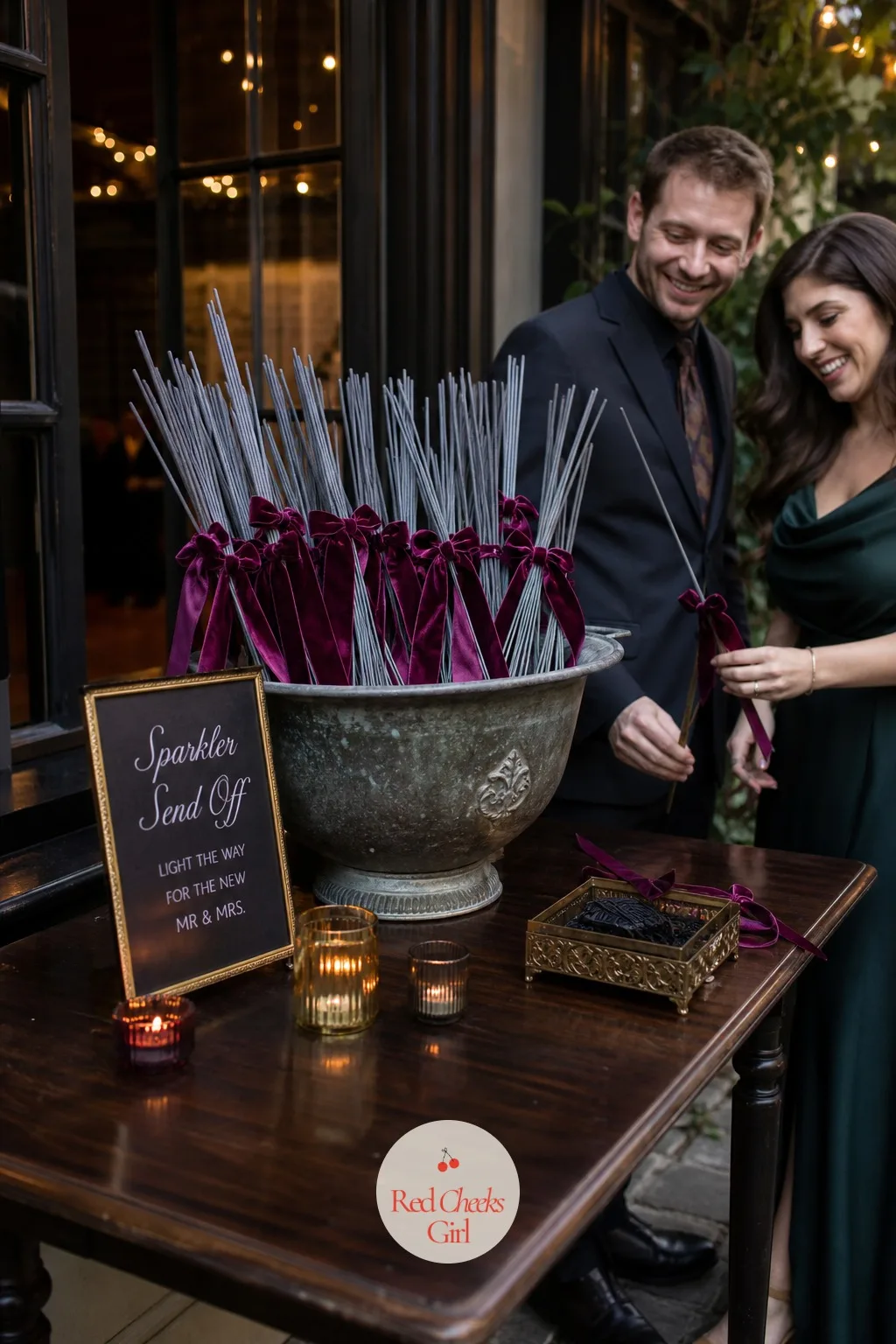 Velvet Ribbon Sparkler Send-Off Station — Handing sparklers out one by one at the door slows everything down right when the energy should be highest. Moody