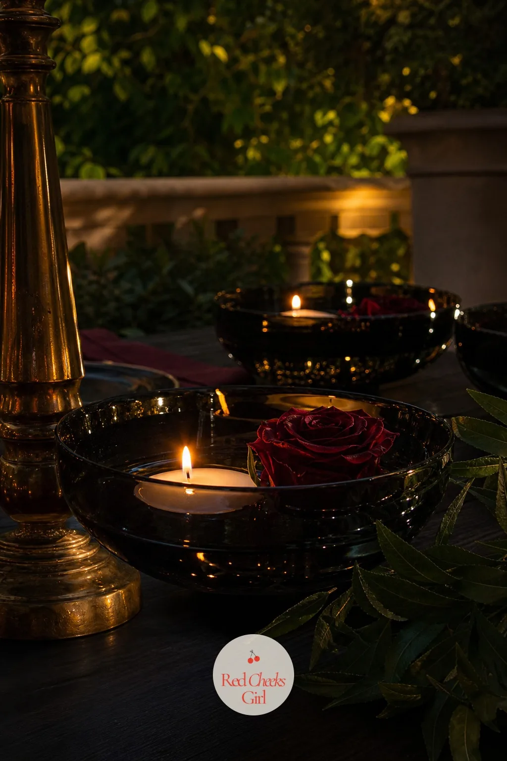 Floating Candles in Black Glass Bowls — Taper candles need holders and height, which is not always possible on a low cocktail table or a narrow shelf. Moody