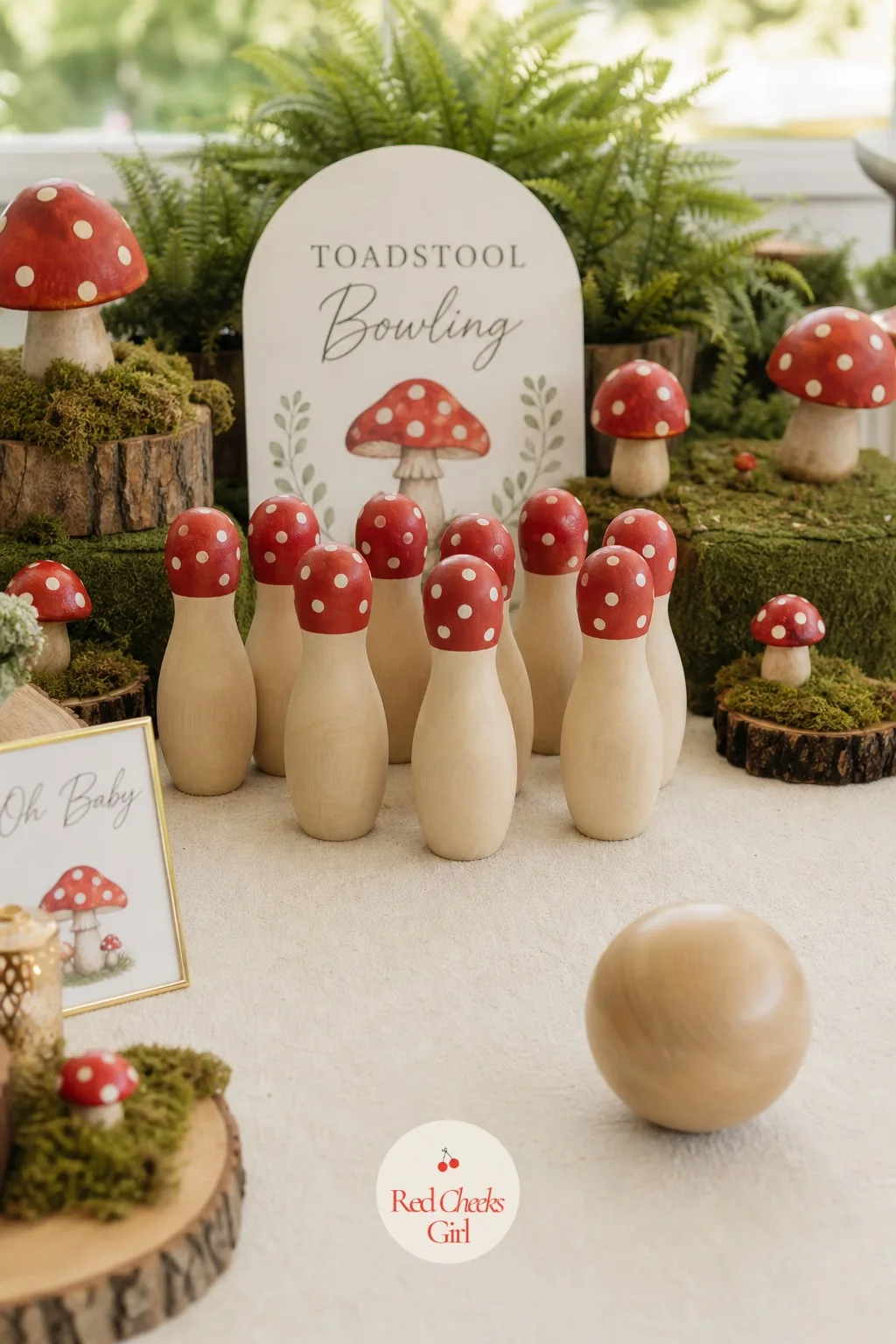 Toadstool Bowling — Bowling pins already look most of the way toward a toadstool, which is why this one takes almost no setup. Mushroom baby shower theme