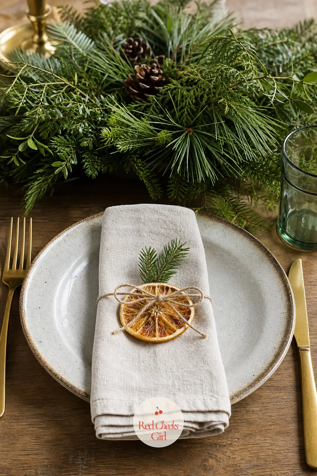 A Low Centrepiece and One Place Setting Worth Copying — Keep the centrepiece low, under the sightline across the table: fresh greenery clippings, a few dried