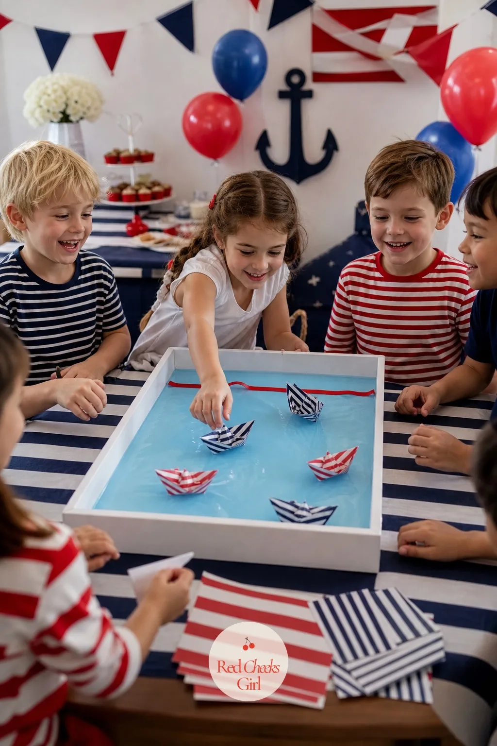 The Paper Boat Race in a Tray of Blue Water — A craft table with nothing to do afterward is only half a station. Nautical birthday party