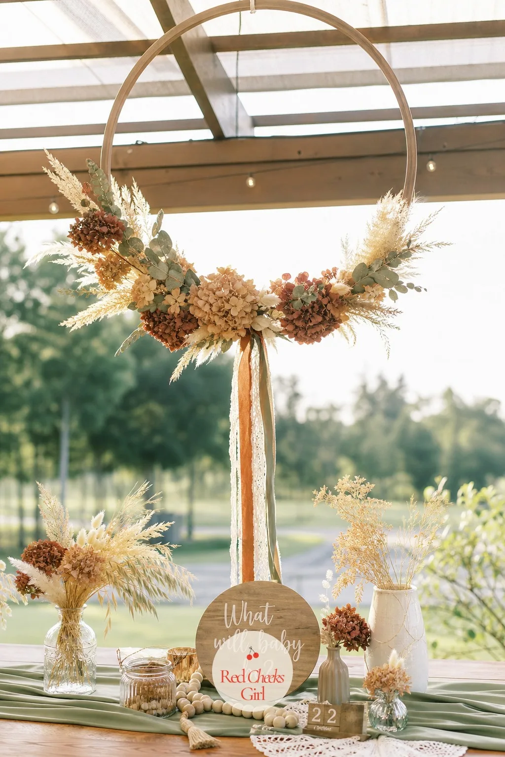 Boho Floral Hoop Centerpiece — A hoop wrapped in dried florals does double duty as a hanging piece or a flat centerpiece ring, which makes it one of the more
