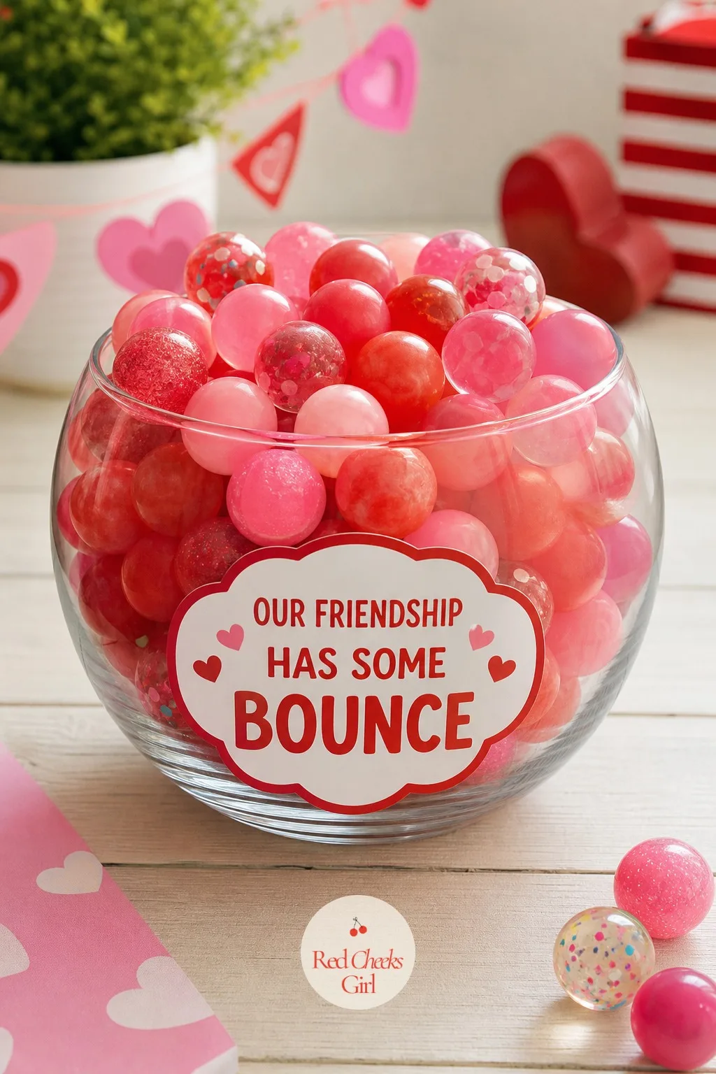 Bulk Bouncy Ball Bowl: Our Friendship Has Some Bounce — A glass bowl heaped with small rubber bouncy balls looks like a candy dish until she tips one into each
