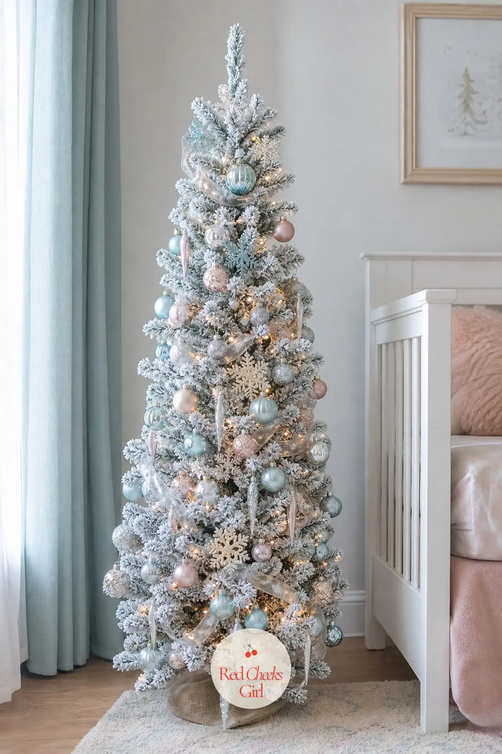 The Flocked Tabletop Tree in Ice Blue and Silver — A small, snow-flocked artificial tabletop tree, pre-lit, swapping the amber warmth of the entry above for