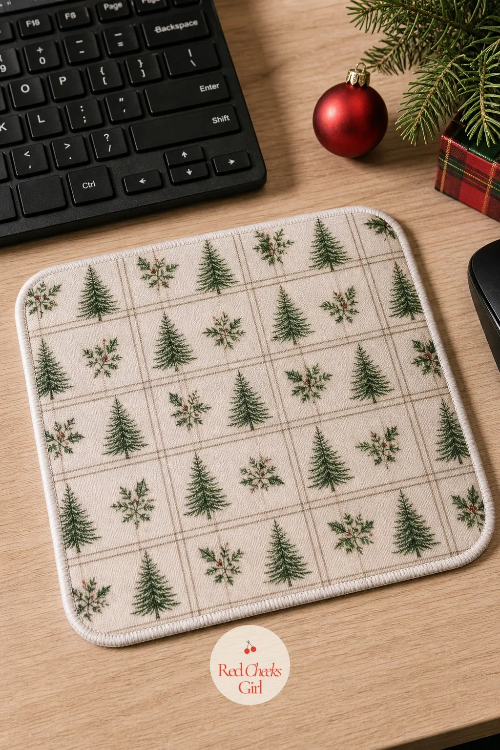 Holiday Mouse Pad Swap — The mouse pad sits under her hand for eight hours a day, so swapping it for a holiday print is one of the only decorations on this