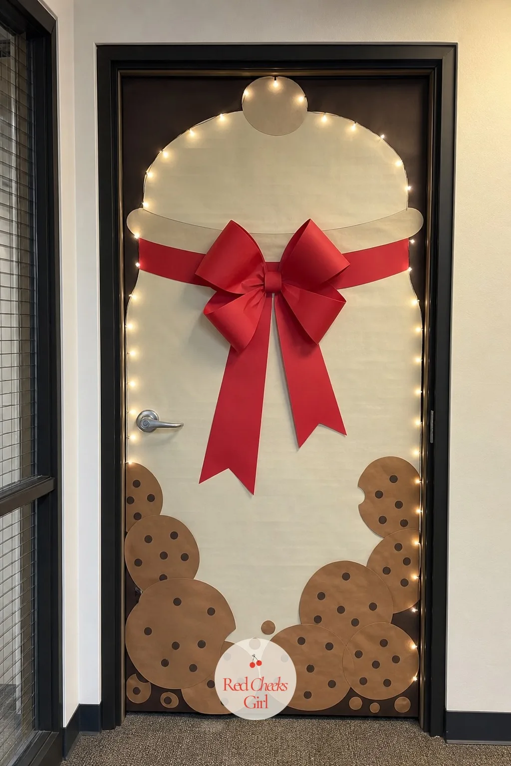 Cookie Jar — A cookie jar is cosy without trying hard, and it gives a door a reason to smile rather than impress. Office door christmas contest