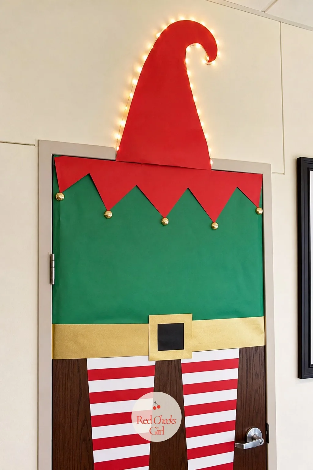 Elf — An elf gives a door personality without needing a full scene around it, which saves time without looking like it saved time. Office door christmas contest