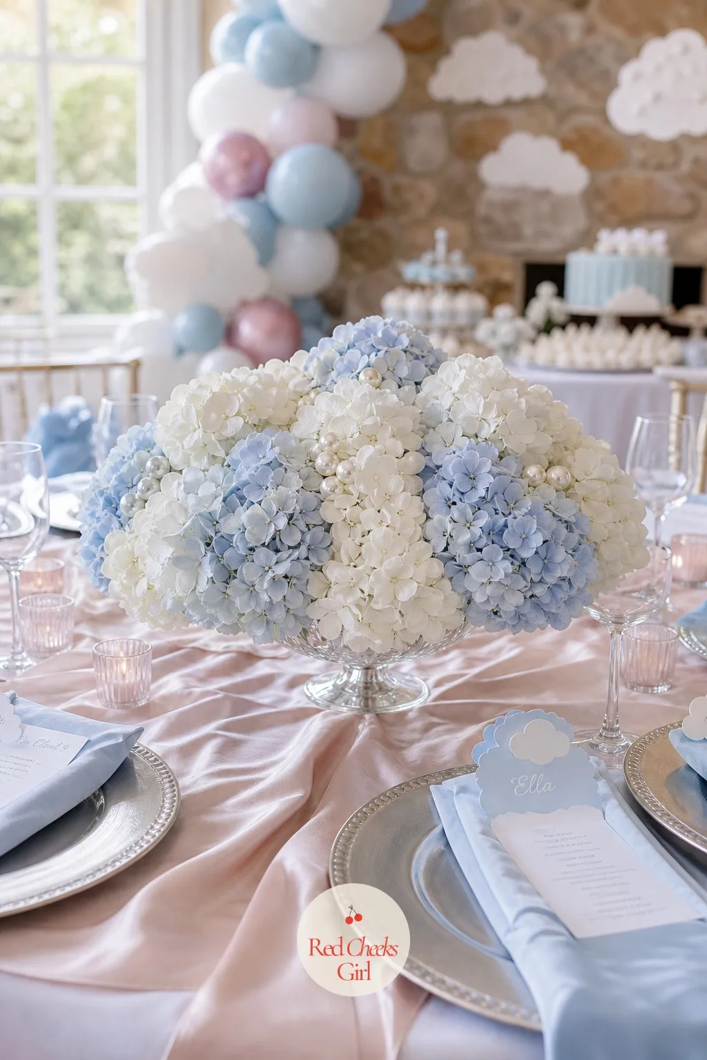 Cloud Centerpiece Bowl — A tall centerpiece blocks every conversation across the table, so this one stays low and dense: a glass compote packed tightly with