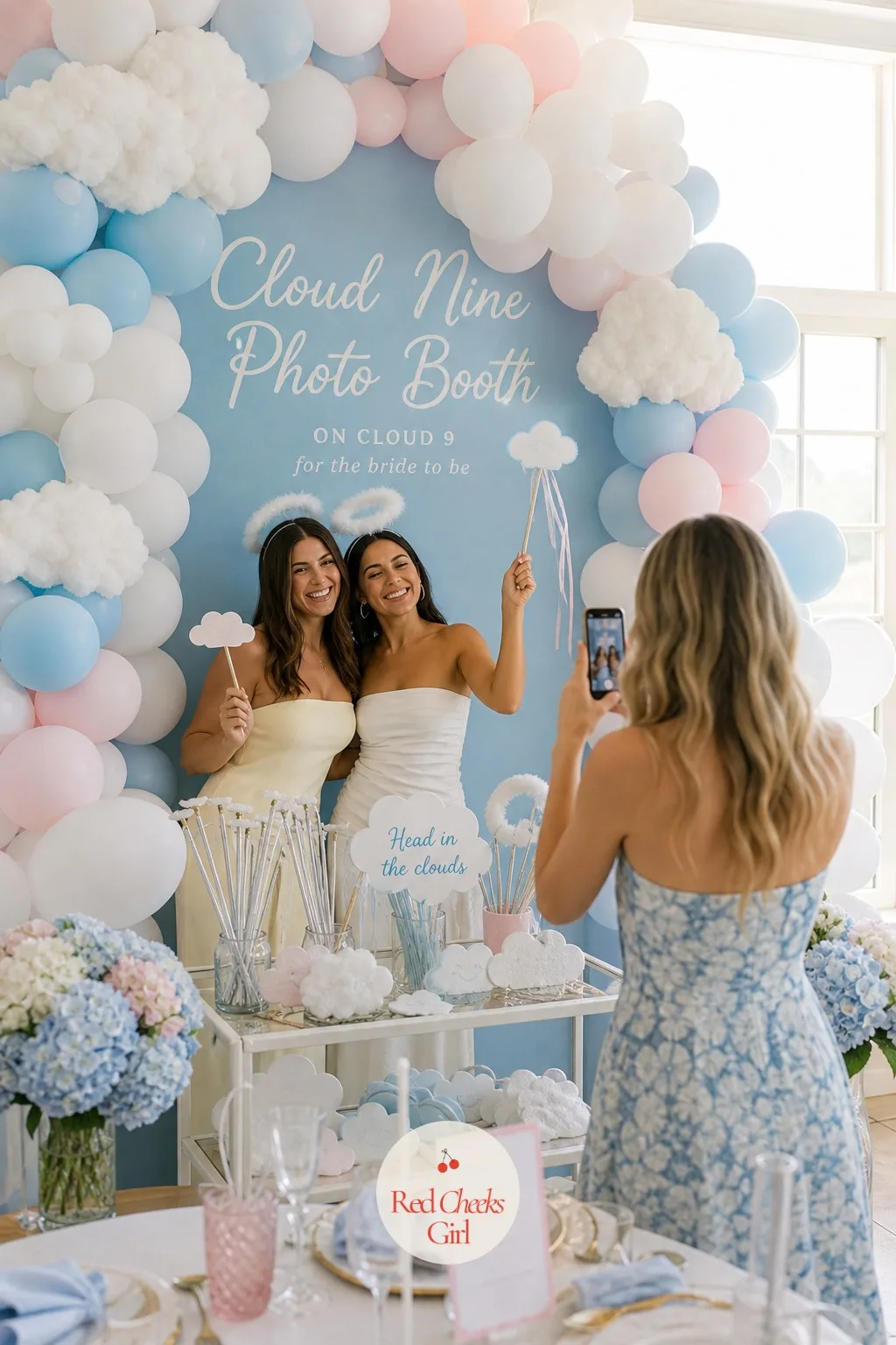 Cloud Nine Photo Booth — Guests will photograph themselves in front of that balloon backdrop all afternoon whether or not anyone gives them a reason to, so