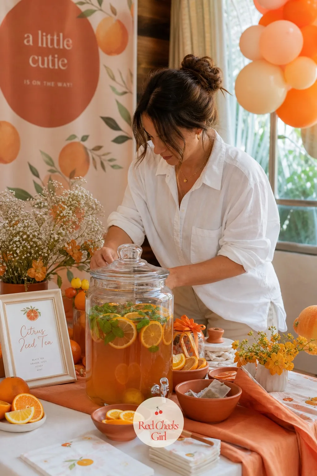 Citrus Iced Tea Station — Not everyone wants something sweet by mid afternoon, and this one gives them somewhere else to go. Orange theme baby shower ideas
