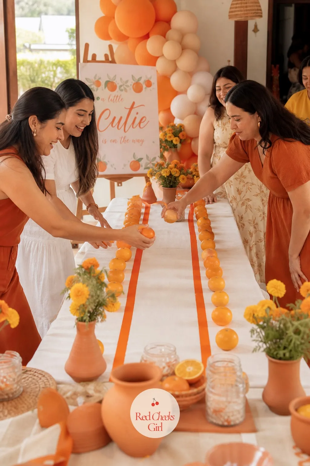 Pass the Orange Relay — Split guests into two lines facing the same direction. Orange theme baby shower ideas