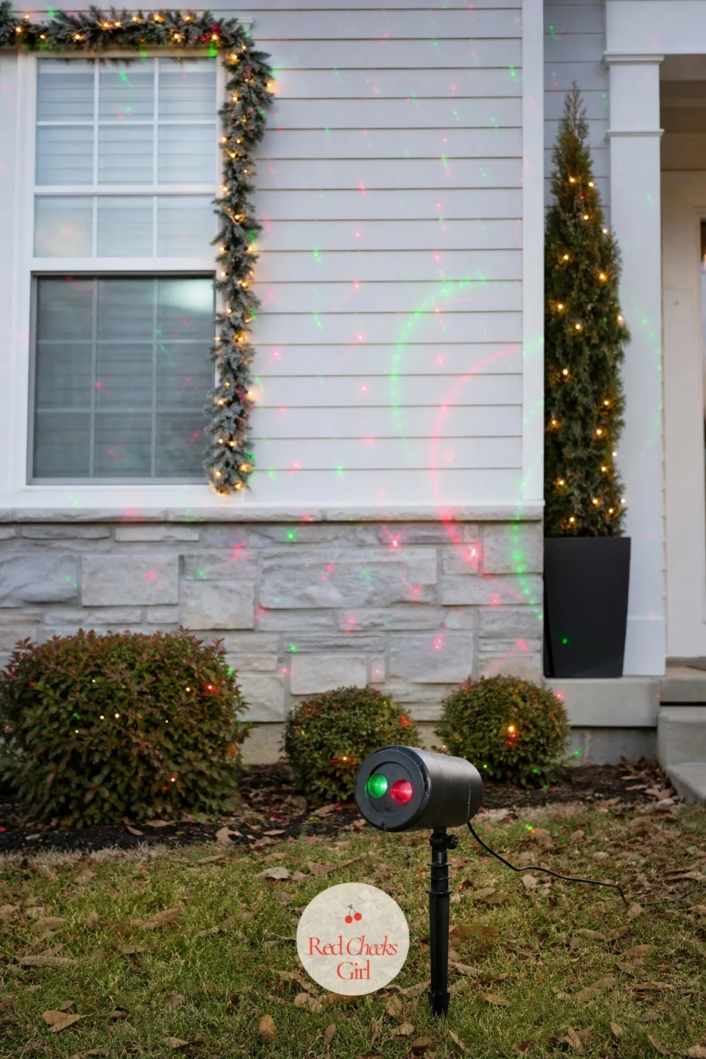 Christmas Light Projector — For anyone who does not own a ladder, or does not intend to, a projector throws a moving pattern across the whole facade from a