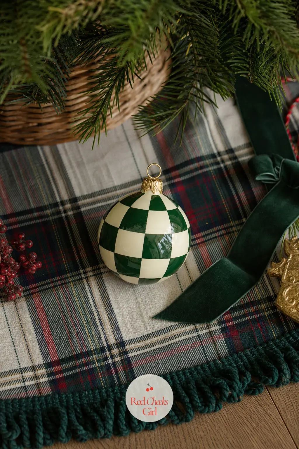 Checkerboard Harlequin Bauble — The Checkerboard Harlequin Bauble is painted forest green and cream in a loose hand-drawn grid, the lines never quite