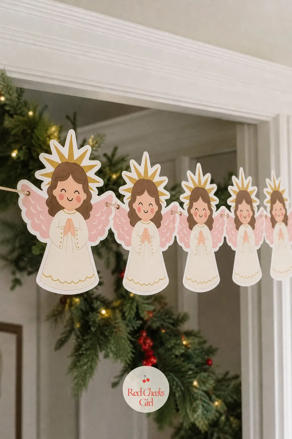 Kitschy Angel — A round, rosy-cheeked angel face with a gold starburst halo and pastel pink wings, the kind that sat on top of the tree every year whether