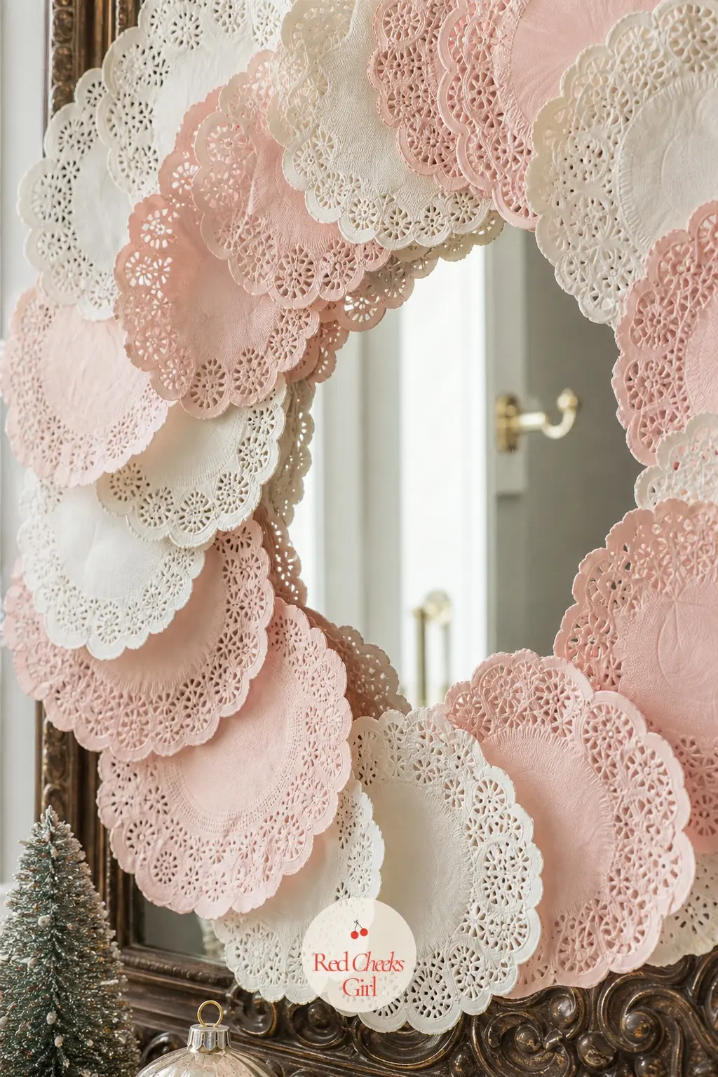 The Blush and Cream Paper Doily Lace Wreath for the Powder Room Mirror — Paper doilies, blush layered under cream, get scalloped edge over scalloped edge