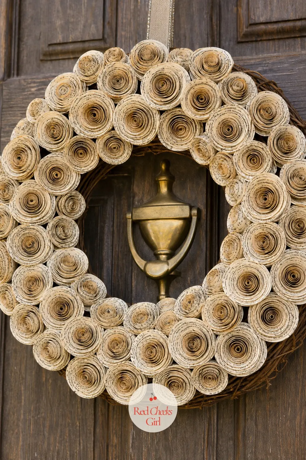 The Cream and Walnut Book Page Rosette Wreath for the Front Door — Old paperback pages get rolled into tight rosettes and glued shoulder to shoulder around a
