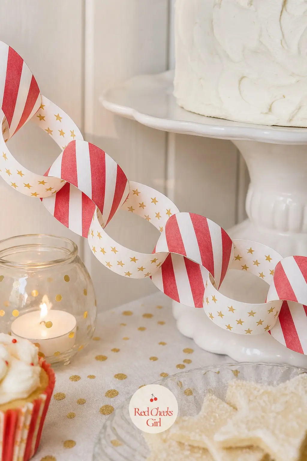 Candy-Striped Stars — A paper chain rather than a shape garland: each ring alternates a band of diagonal red and white candy stripe with a band of tiny gold