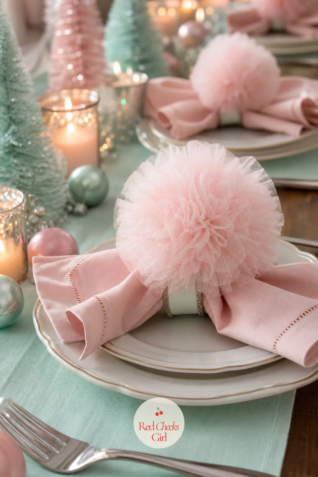 The Napkin Rings, Finished with a Tulle Pom-Pom — Twelve napkin rings, each finished with a small tulle pom-pom instead of a bow, slide onto blush napkins