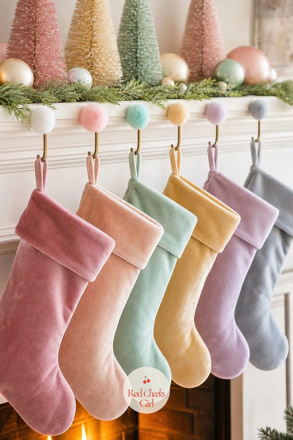 The Stocking Hooks, Each Finished with a Pastel Pom-Pom — Six stocking hooks hold six velvet stockings in the house palette, each hook finished with a single