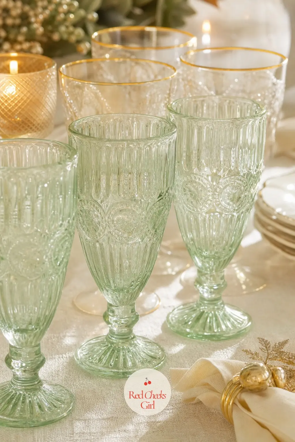 The Water Goblets, Tinted the Softest Mint — Six mint glass goblets stand beside gold-rimmed water glasses, the pale green only noticeable once the light hits