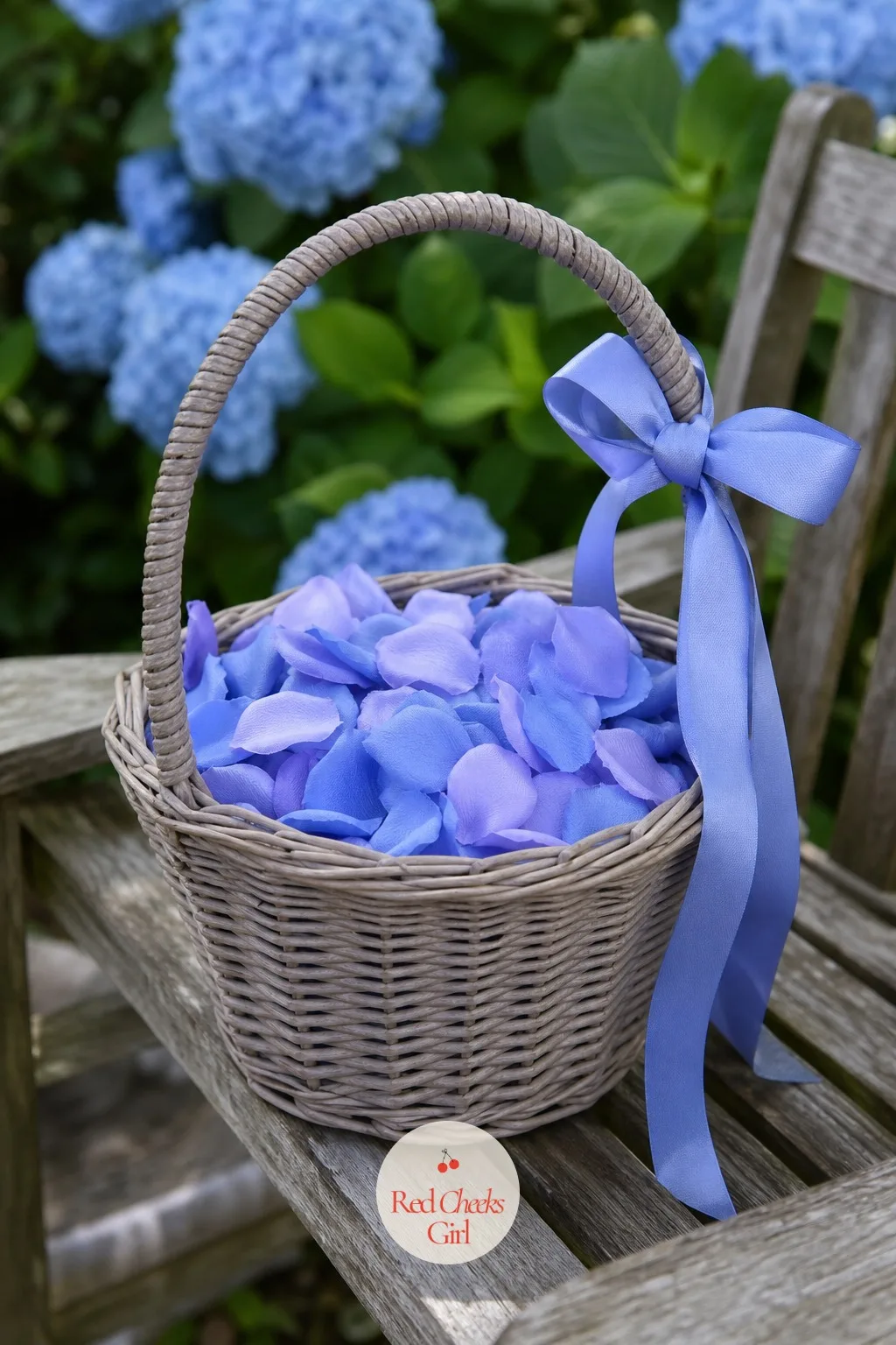 The Flower Girl's Petals — She walks down the aisle before anyone important, tossing color as she goes, and a basket in the right shade makes her part of the