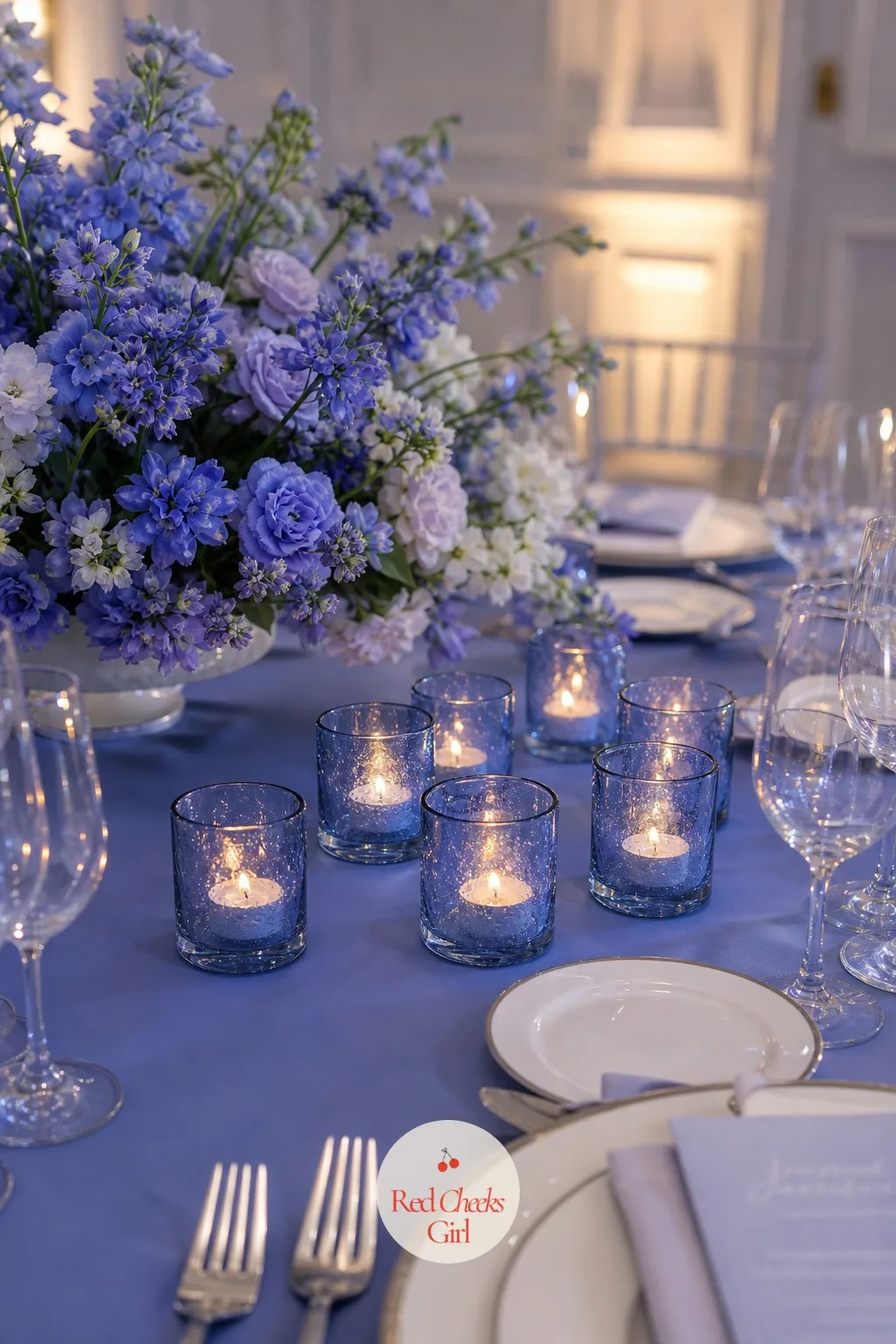 The Votive Candles — Once dinner service starts and the overhead lights dim, it is the small glow at table height that sets the mood, not the chandelier.