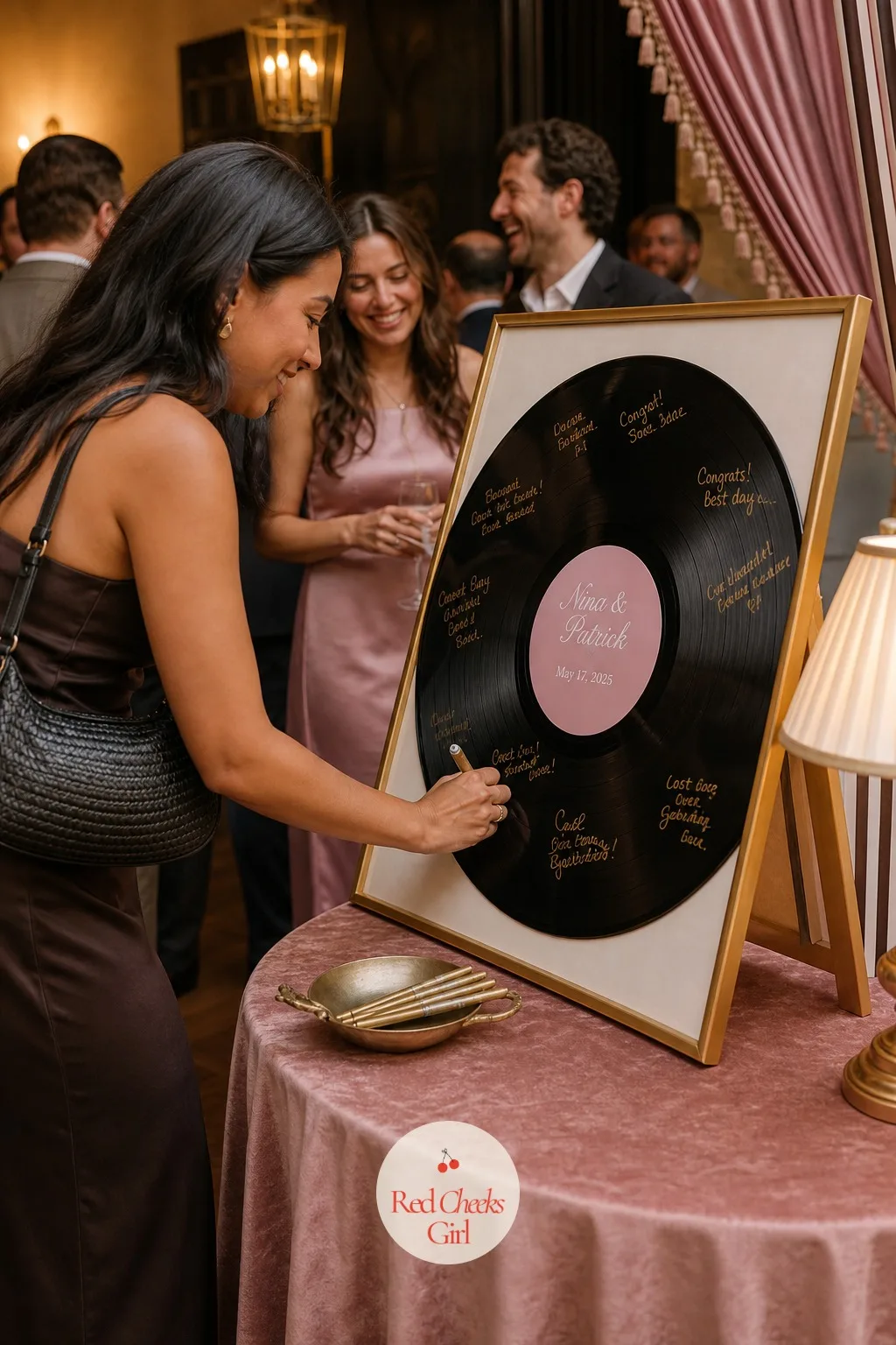 A Vinyl Record Guests Sign Instead Of A Book — Standing near the entrance, an oversized blank vinyl record waits for guests to sign with a gold paint pen, a