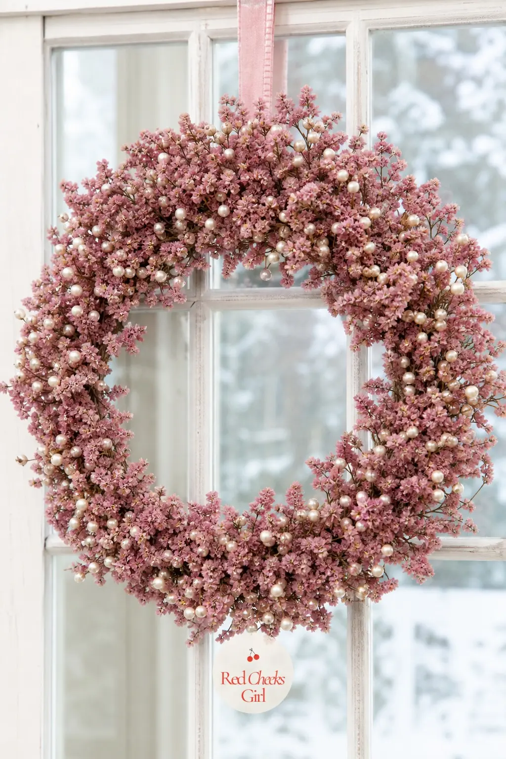 The Dusty Rose Statice and Pearl Pip Berry Wreath for the Baby Girl's Window — Dried statice in a dusty, faded rose sits thick around the ring with