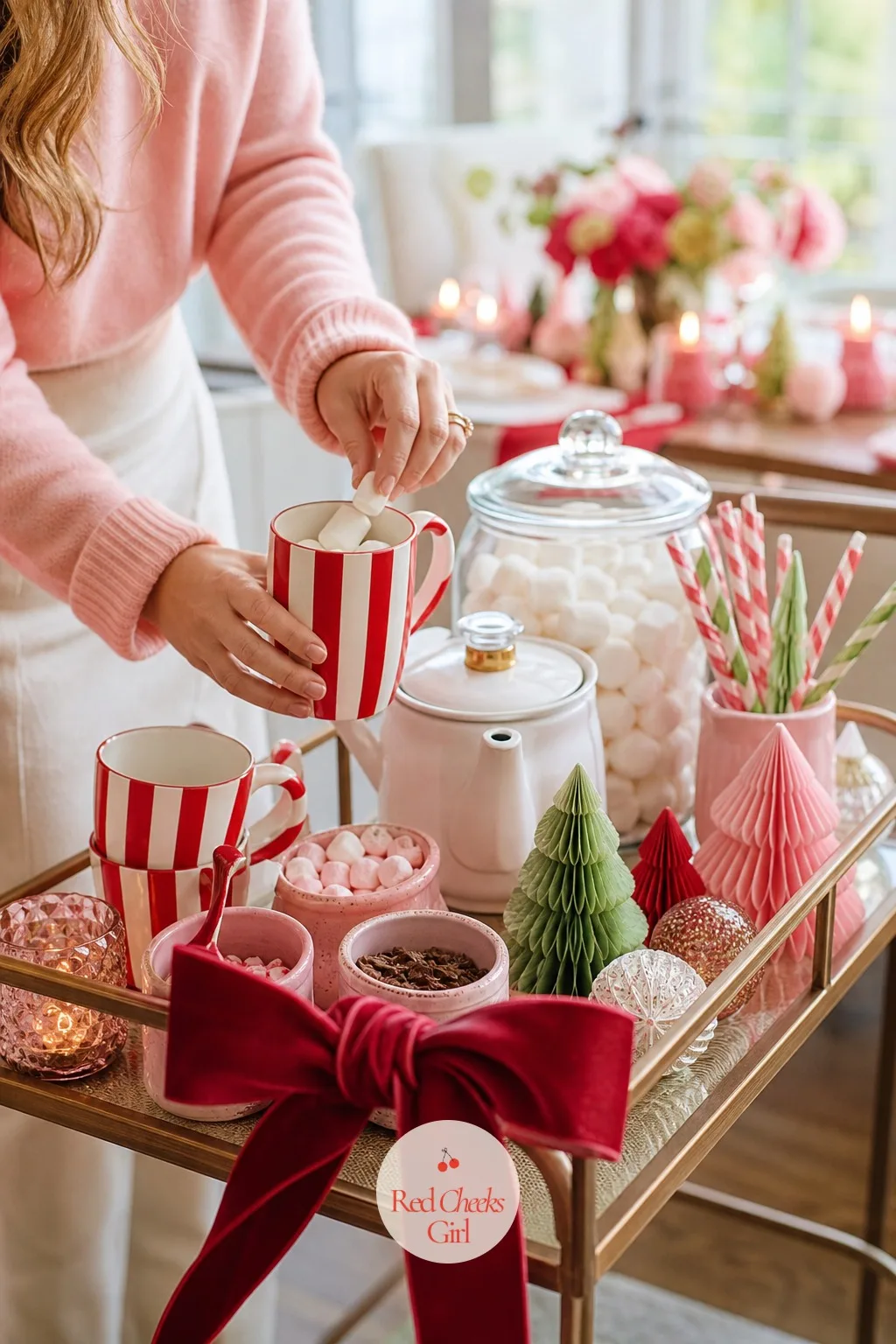 A Hot Cocoa Station on a Tray — Nobody wants to be the one stirring drinks all night, so give guests a station they can work themselves. Pink red and green