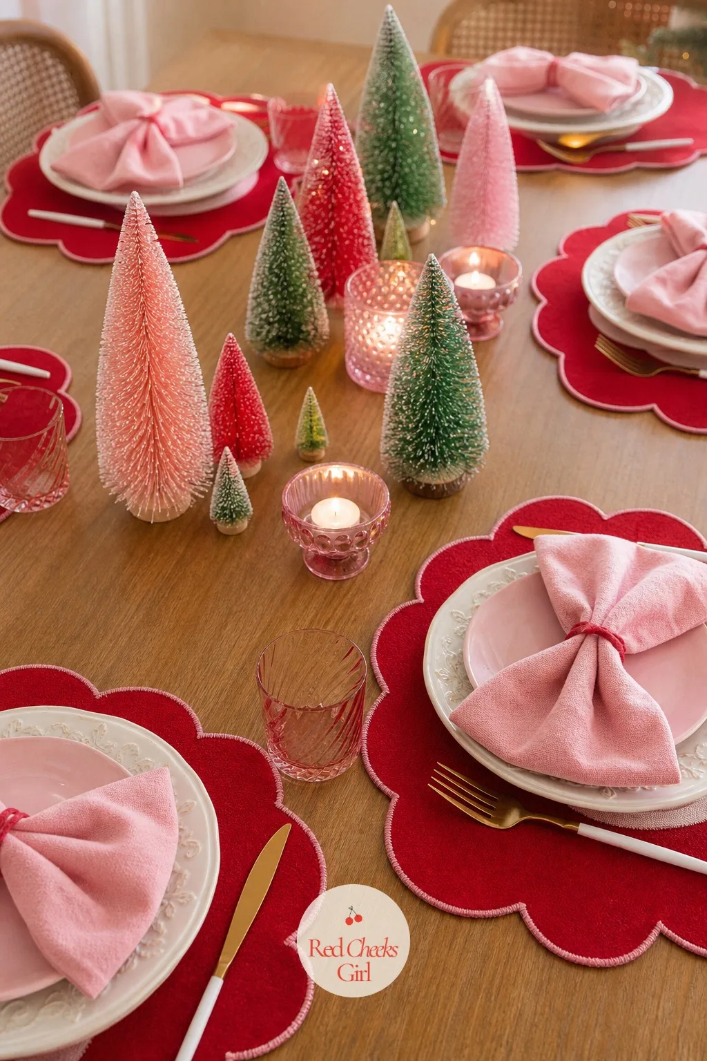 Scalloped Placemats With Napkins Folded Into Bows — A flat napkin on a flat placemat looks like a setting nobody thought about twice. Pink red and green