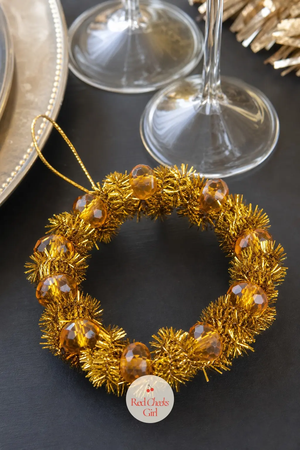 The Gold and Amber Bead Wreath for the New Year Countdown — Gold metallic pipe cleaners threaded with amber glass beads give this one a warm, candlelit glow