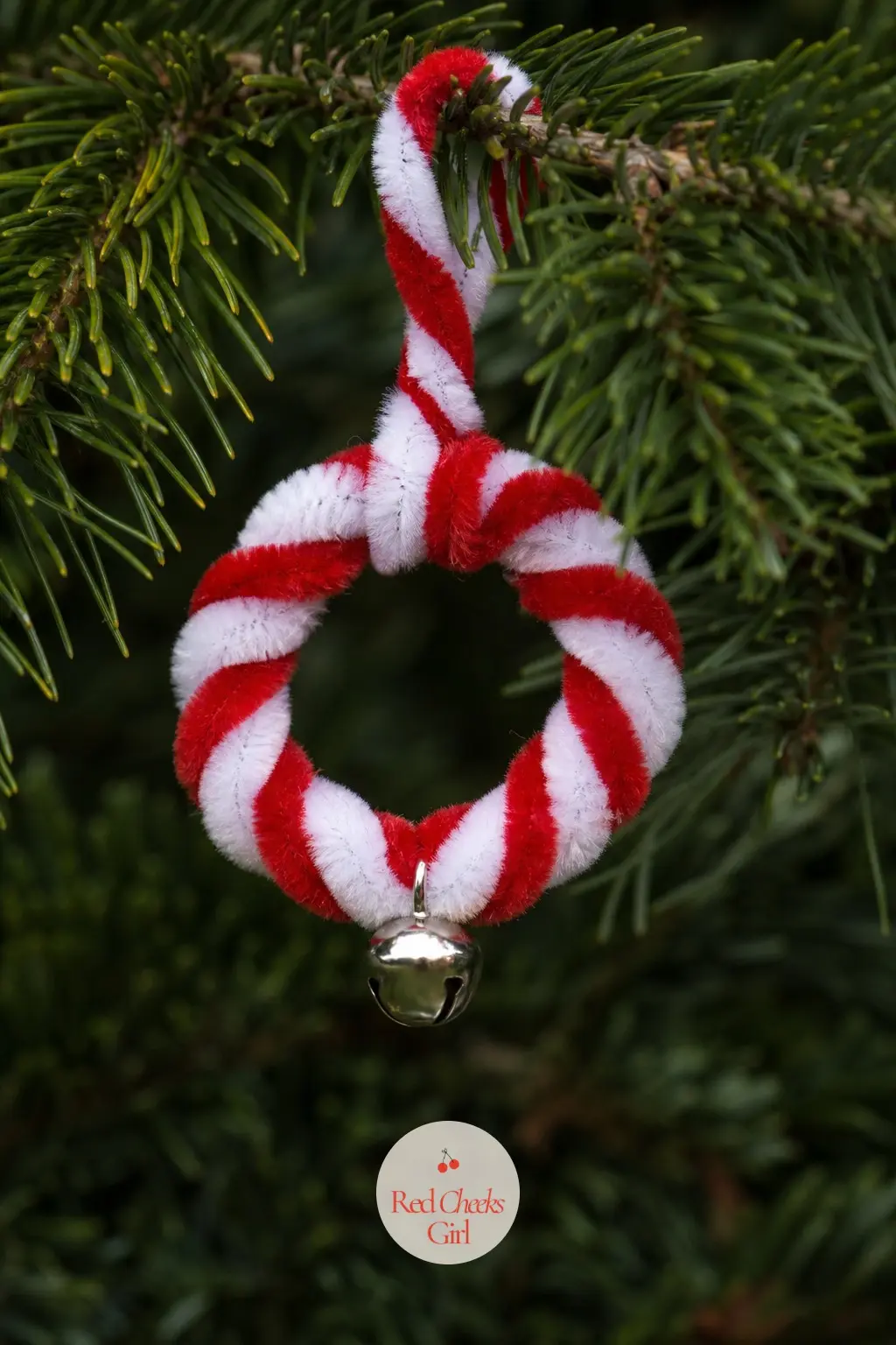 The Red and White Candy Cane Twist Mini Wreath — Twist a red and a white pipe cleaner together along their full length so the stripe runs the whole way round