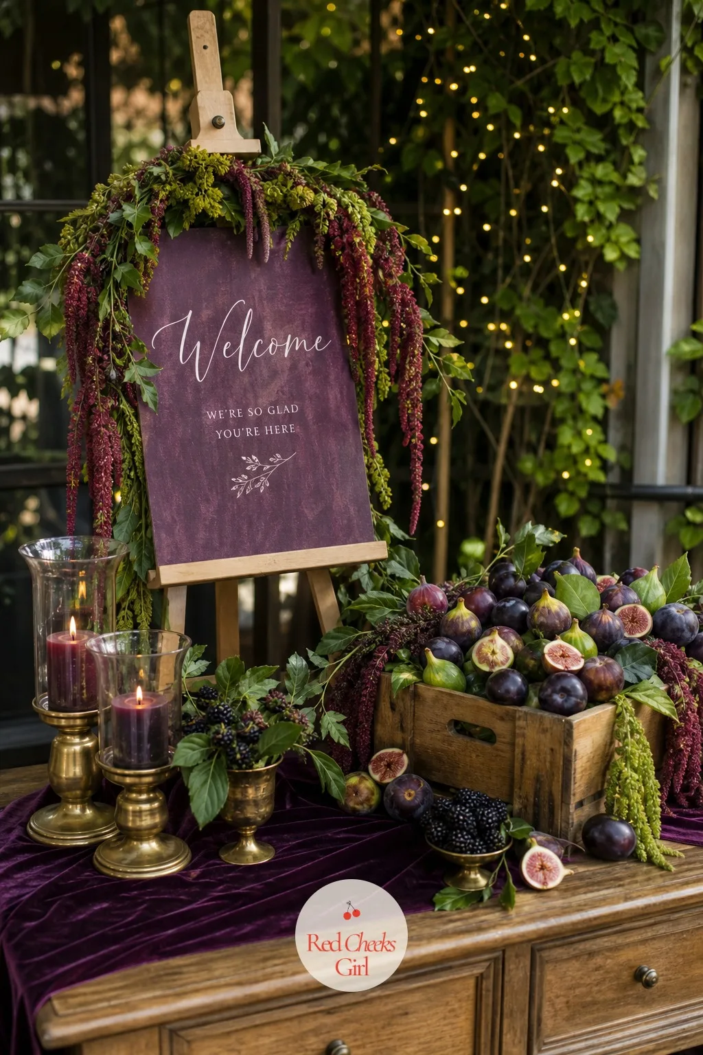 A Welcome Table in Fresh Figs and Trailing Amaranthus — The first table any guest actually stops at is the one with her name on it, and it is worth more than a