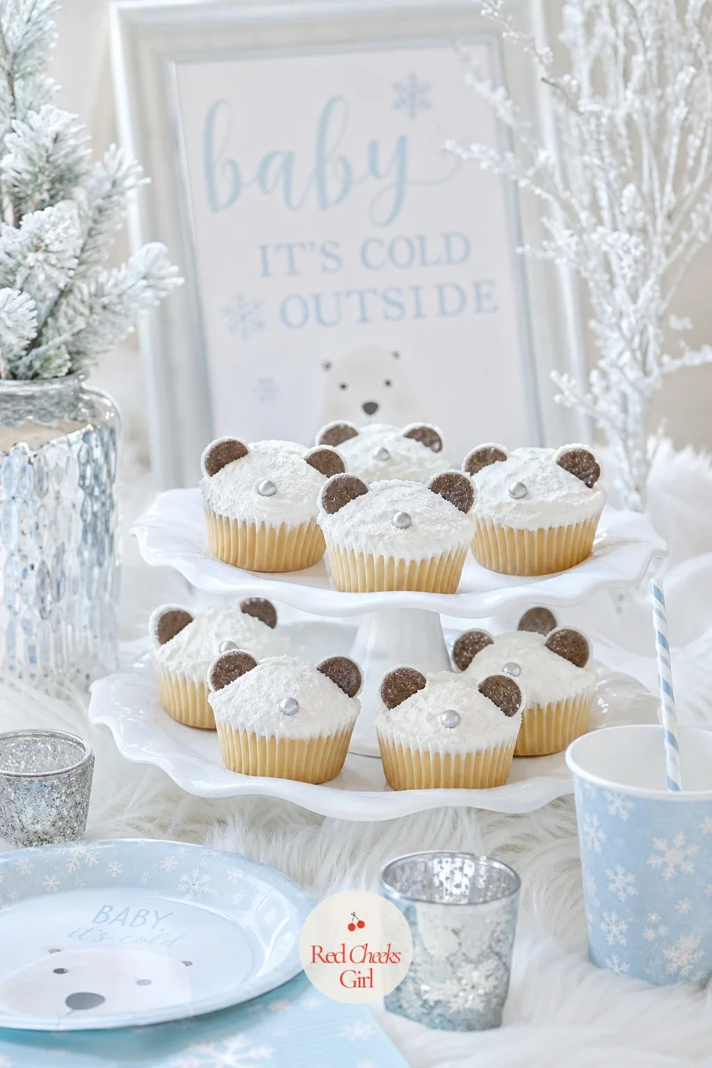 Bear-Face Cupcakes with Piped Ears — White buttercream swirled flat on top, two chocolate wafer cookies pressed in as ears, and a single edible silver pearl