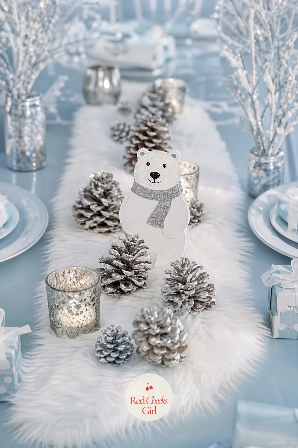 Faux Fur and Pinecone Centerpiece with Bear Cutout — A strip of white faux fur runs down the centre of the table like a runner, with a handful of