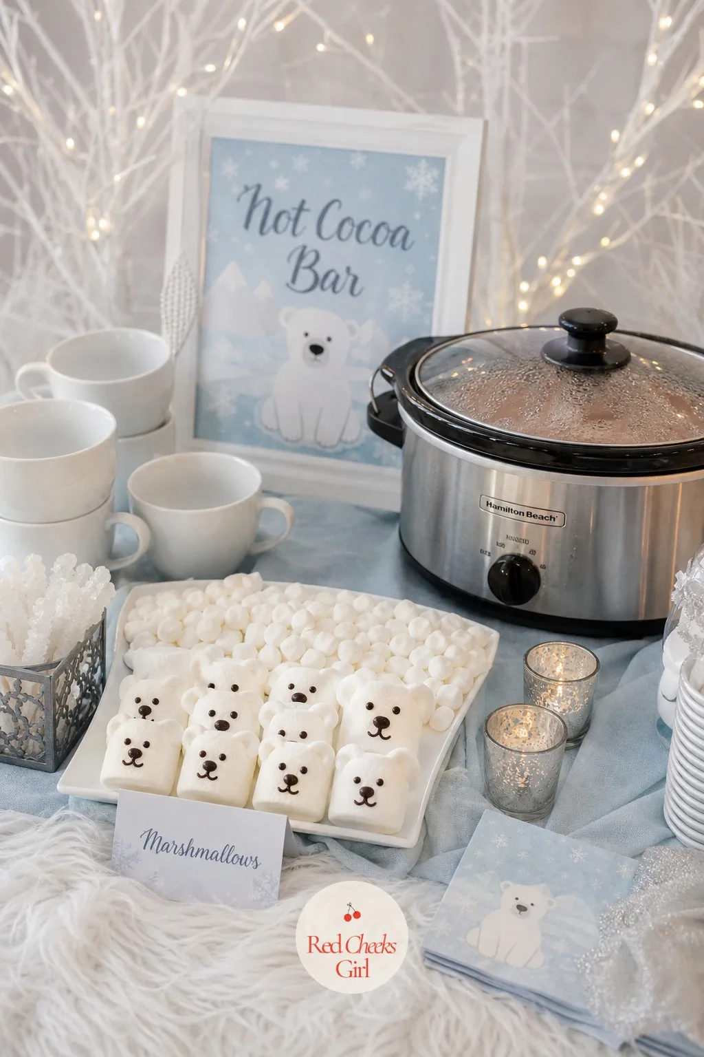 Hot Cocoa Bar with Bear Marshmallows — A slow cooker of hot cocoa sits beside a tray of toppings: mini marshmallows, white chocolate shavings, and a few larger