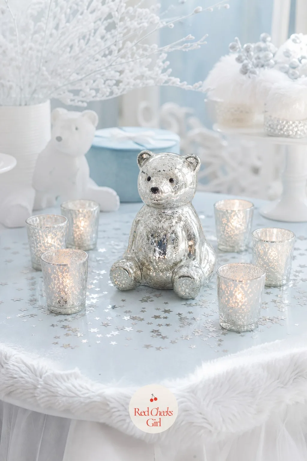 Mercury Glass Bear Figurine Centerpiece — A cluster of small mercury glass votives at different heights surrounds one larger white ceramic polar bear figurine