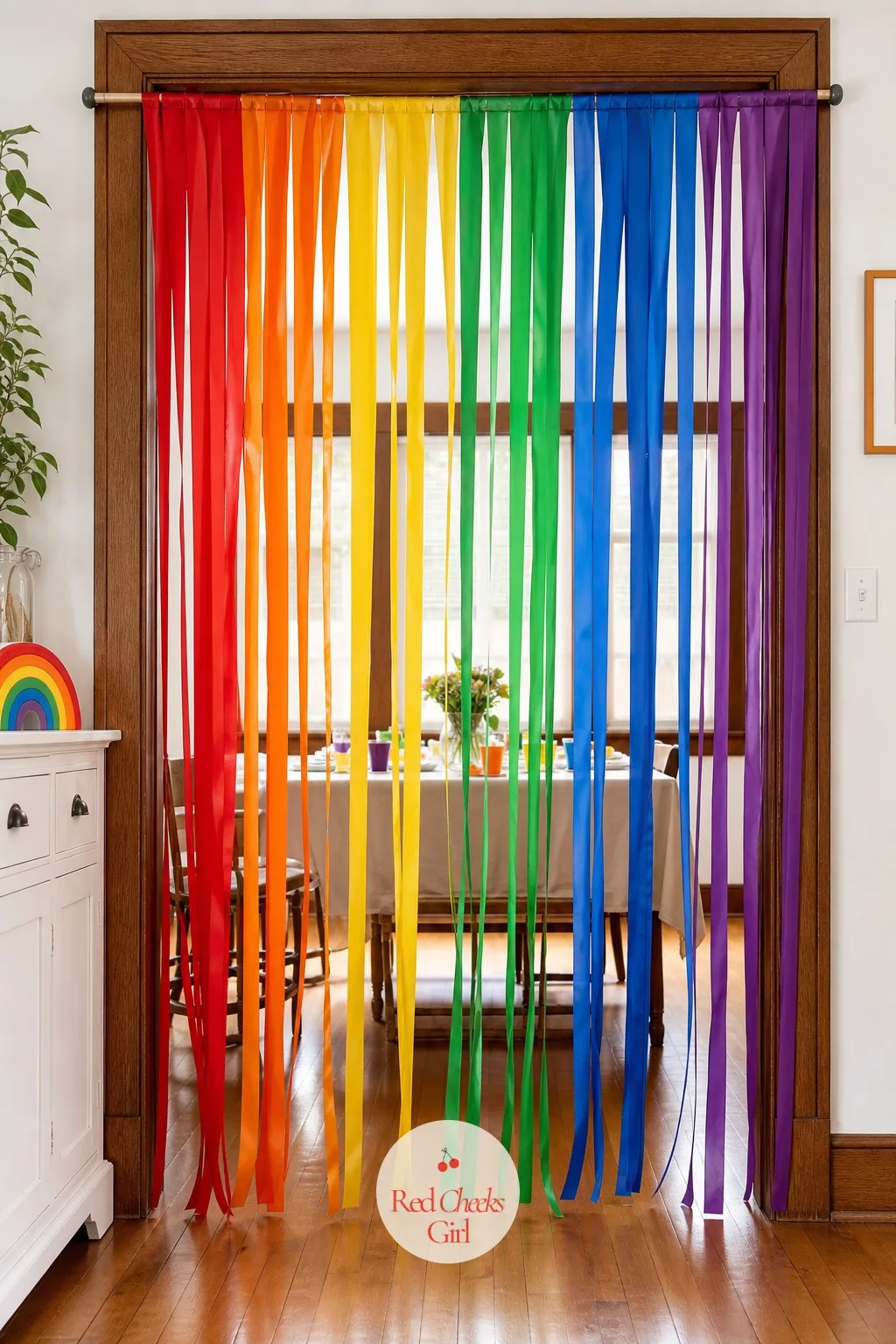A Ribbon Doorway At The Entrance — First impressions happen at the door, not at the dessert table, and a plain doorway says nothing about what is coming.
