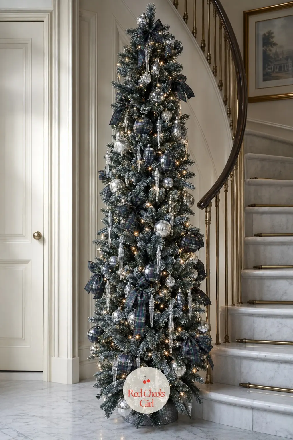 The Black Watch Pencil Tree — Where the other two trees go full, this one goes narrow: a slim pre-lit pencil tree built for a tight corner or a foyer where