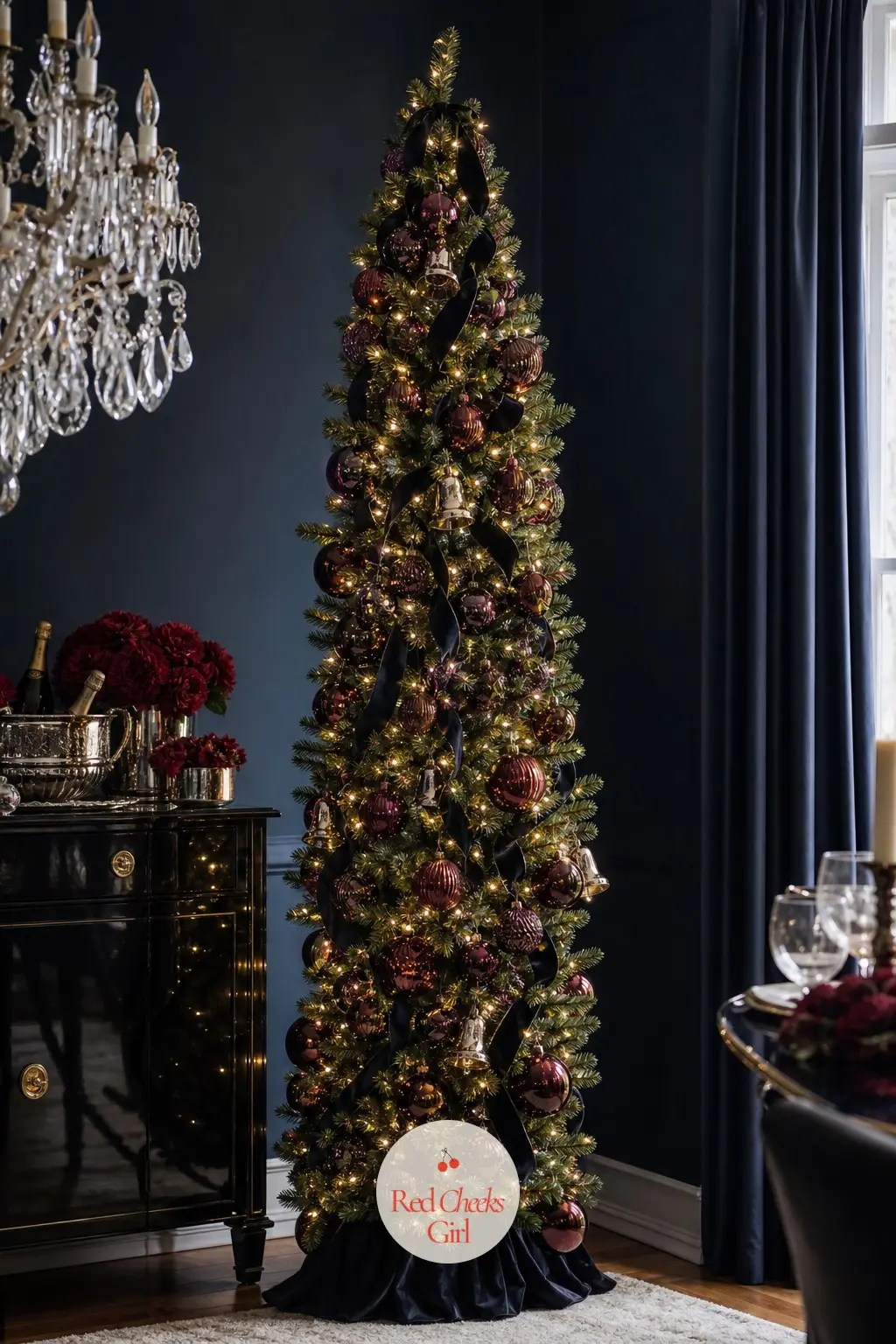 The Midnight Wine Pencil Tree — Tall and slim, this pre-lit pencil tree goes darker than anything else in the collection, wine-colored mercury glass balls